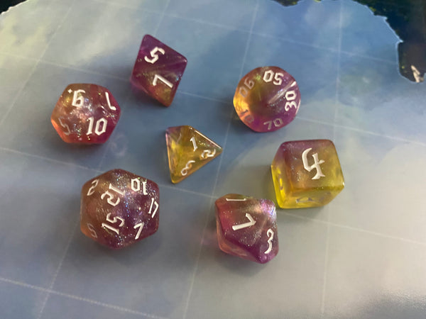 True Strike Purple and Gold Bardic Rockstar Resin Dice Set - 7-Piece Polyhedral Set for D&D and TTRPGs, featuring a Bold and Eye-Catching Design