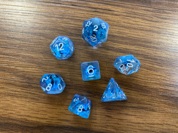 Blue Eldritch Eye Resin Dice Set - 7-Piece Polyhedral Set for D&D and TTRPGs, featuring a Demon Eye Design